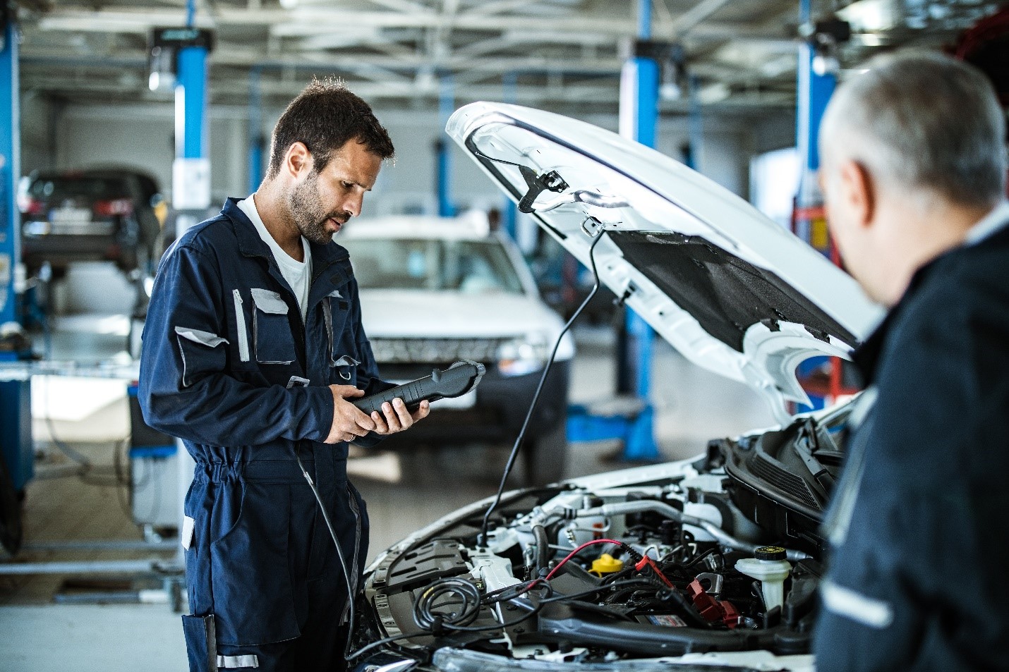 Toyota preferred technician assesses the engine and collision damage on a Toyota